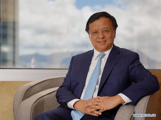 2020年6月18日拍摄的照片显示,香港交易及结算所有限公司(HKEX)的首席执行官李国宝(Charles Li)专访了中国南方香港的新华社。 (新华社/王申)